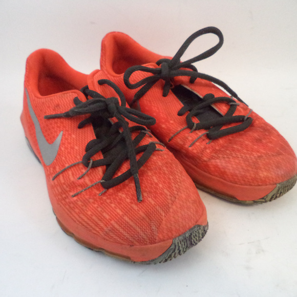orange nike shoes youth
